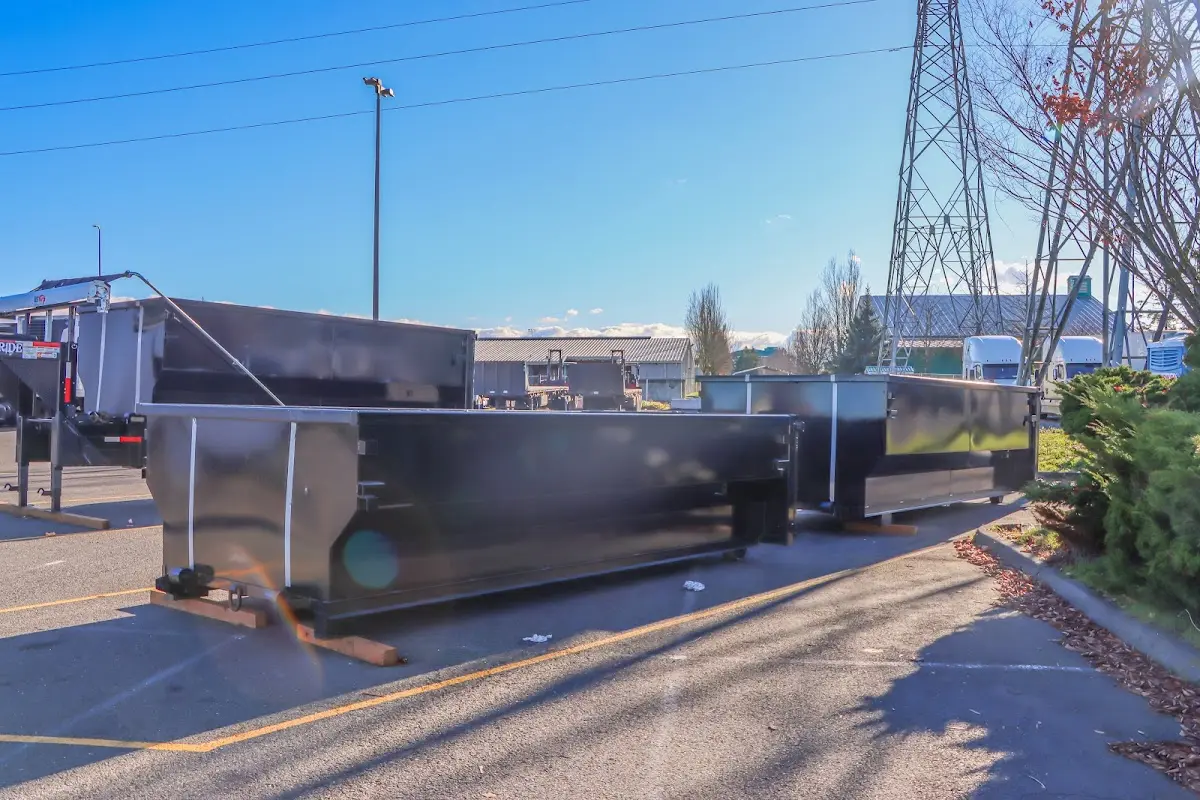 Roll-off dumpster ready for waste disposal at job site for Construction Dumpster Rental in Tiverton